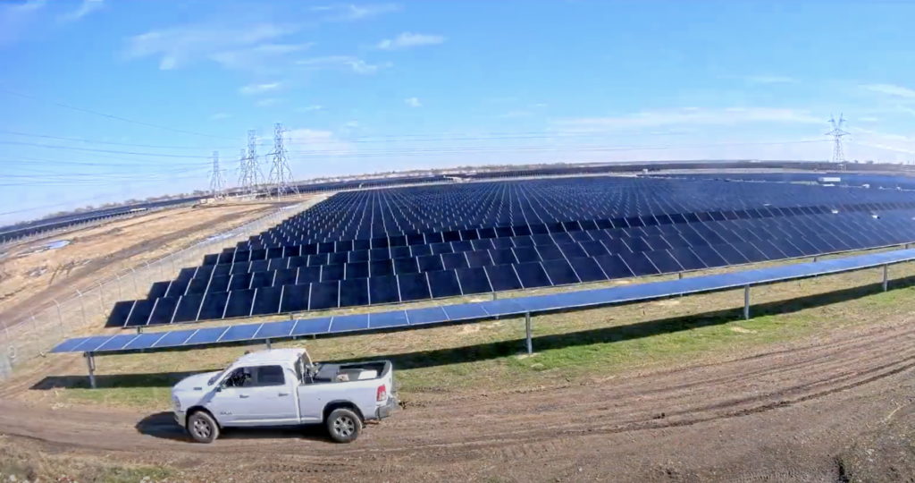 Solar panels with truck in foreground