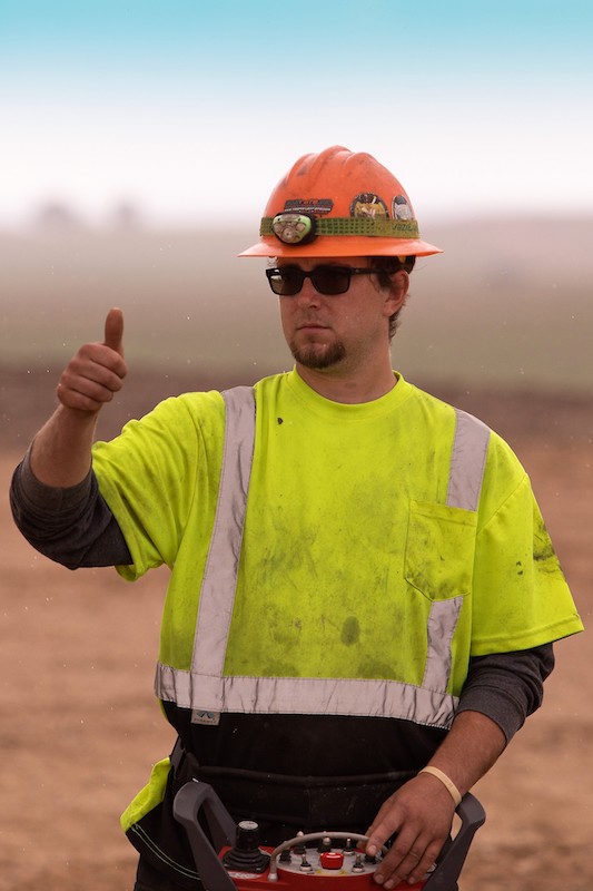 Construction worker giving a thumbs up