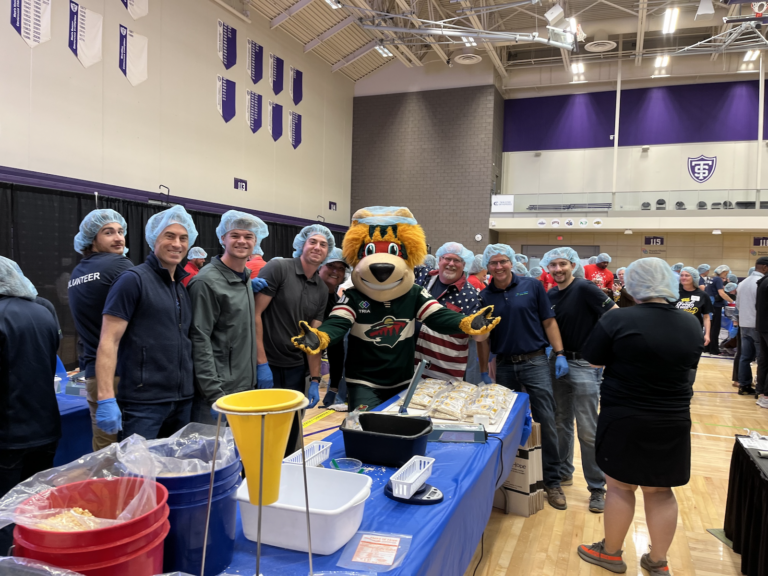 People and Wild mascot at 9/11 Feed My Starving Children event