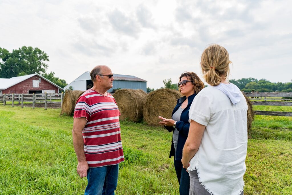 People talking on farm