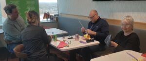 People making paper rockets
